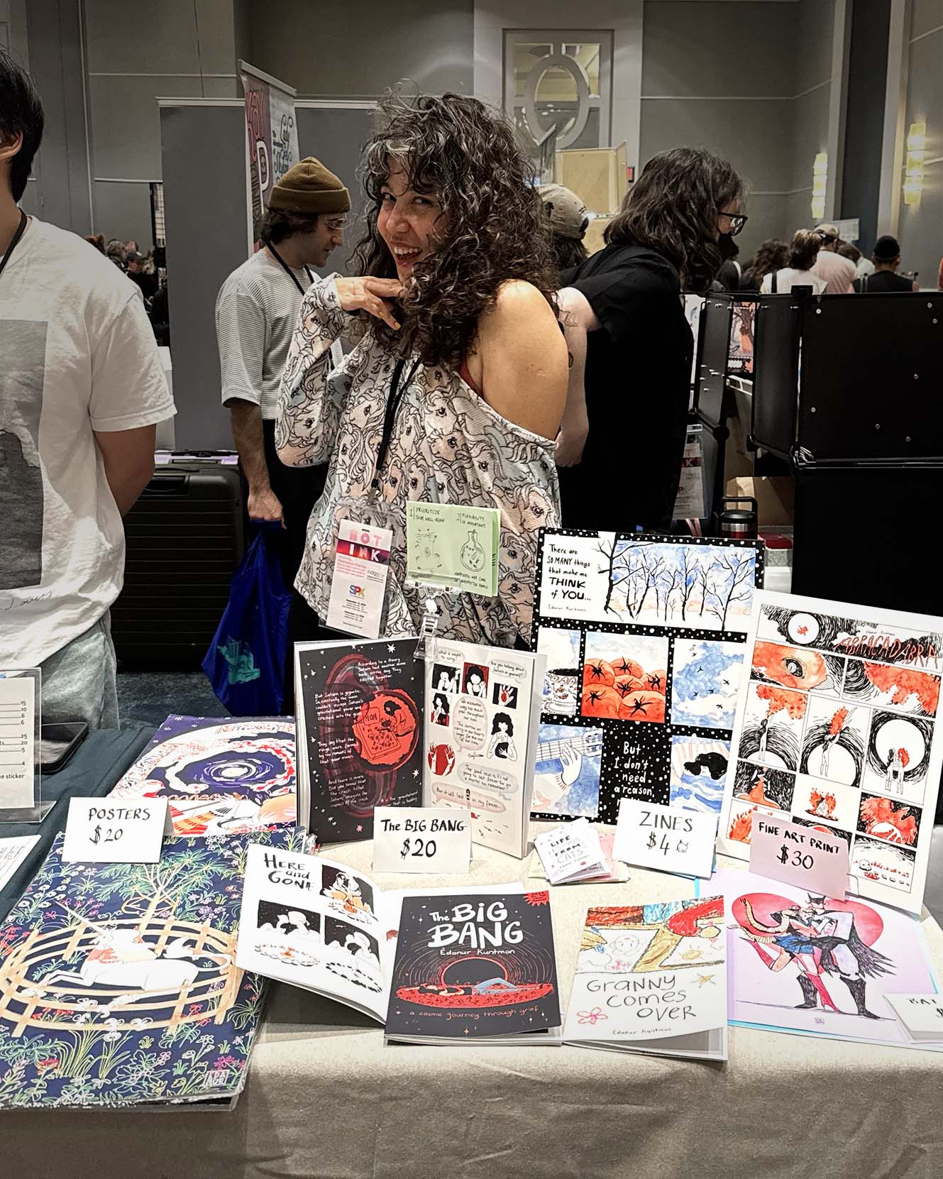 Edanur Kuntman at a comics table at SPX